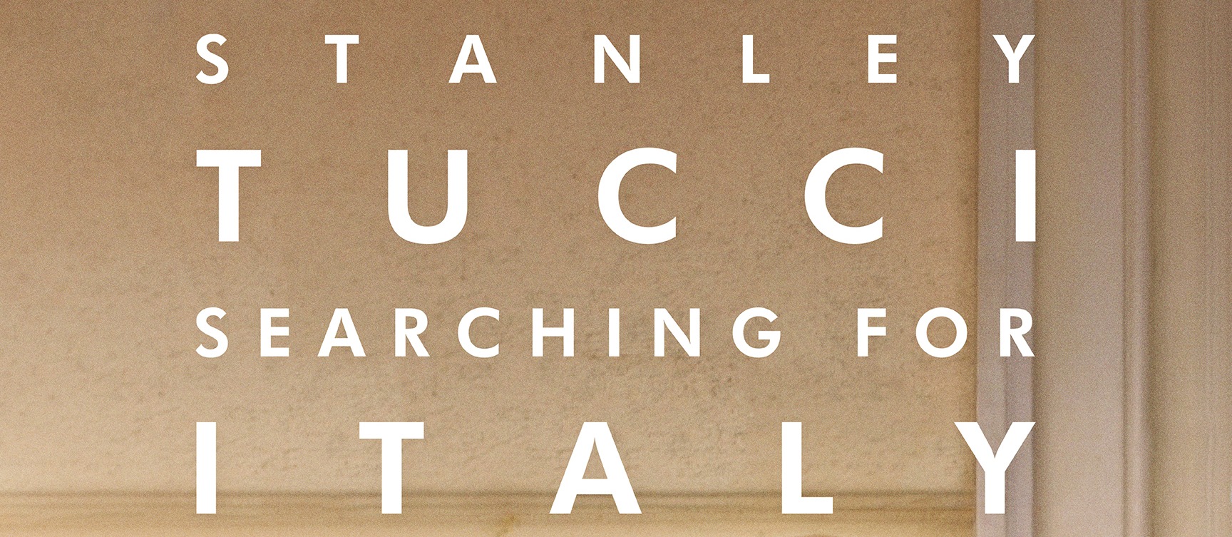 Tucci_keyart_Wall_Vertical_dated_72dpi